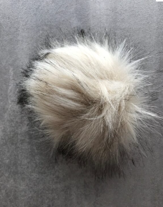 Pompon beige/schwarz verspielt